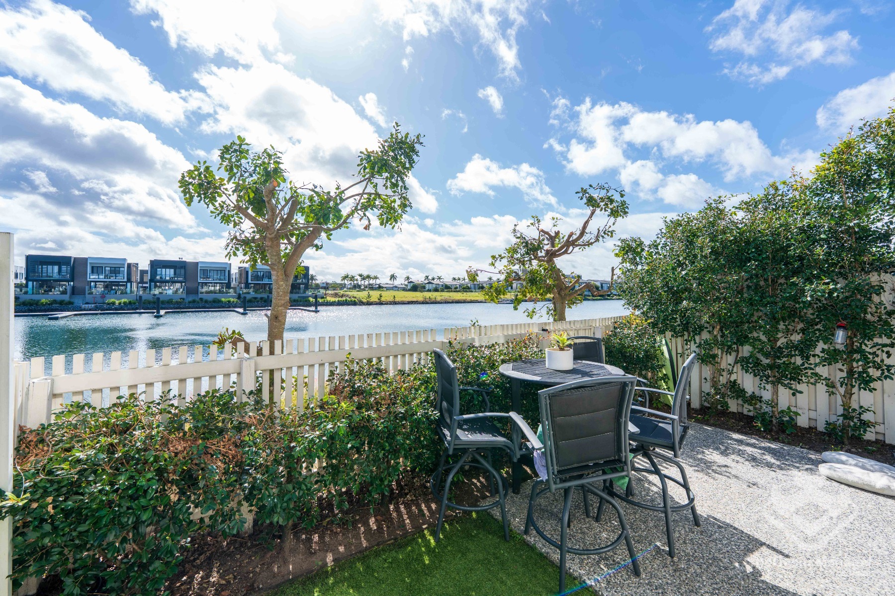 Absolute Waterfront Living | North-Facing Townhouse | Walk to Hope Island Marketplace